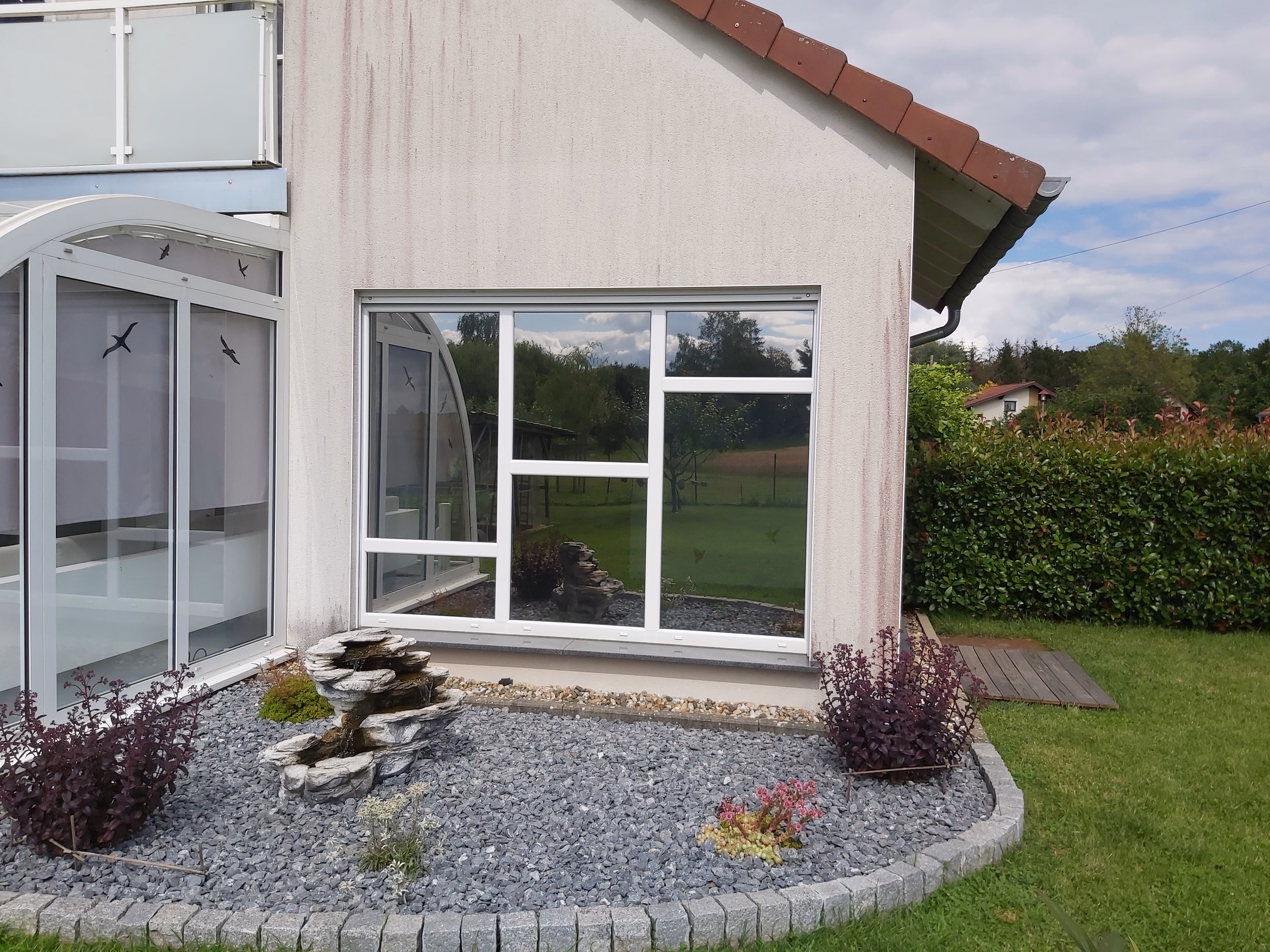 Hitzeschutzfolie silber verspiegelt auf Glasscheiben