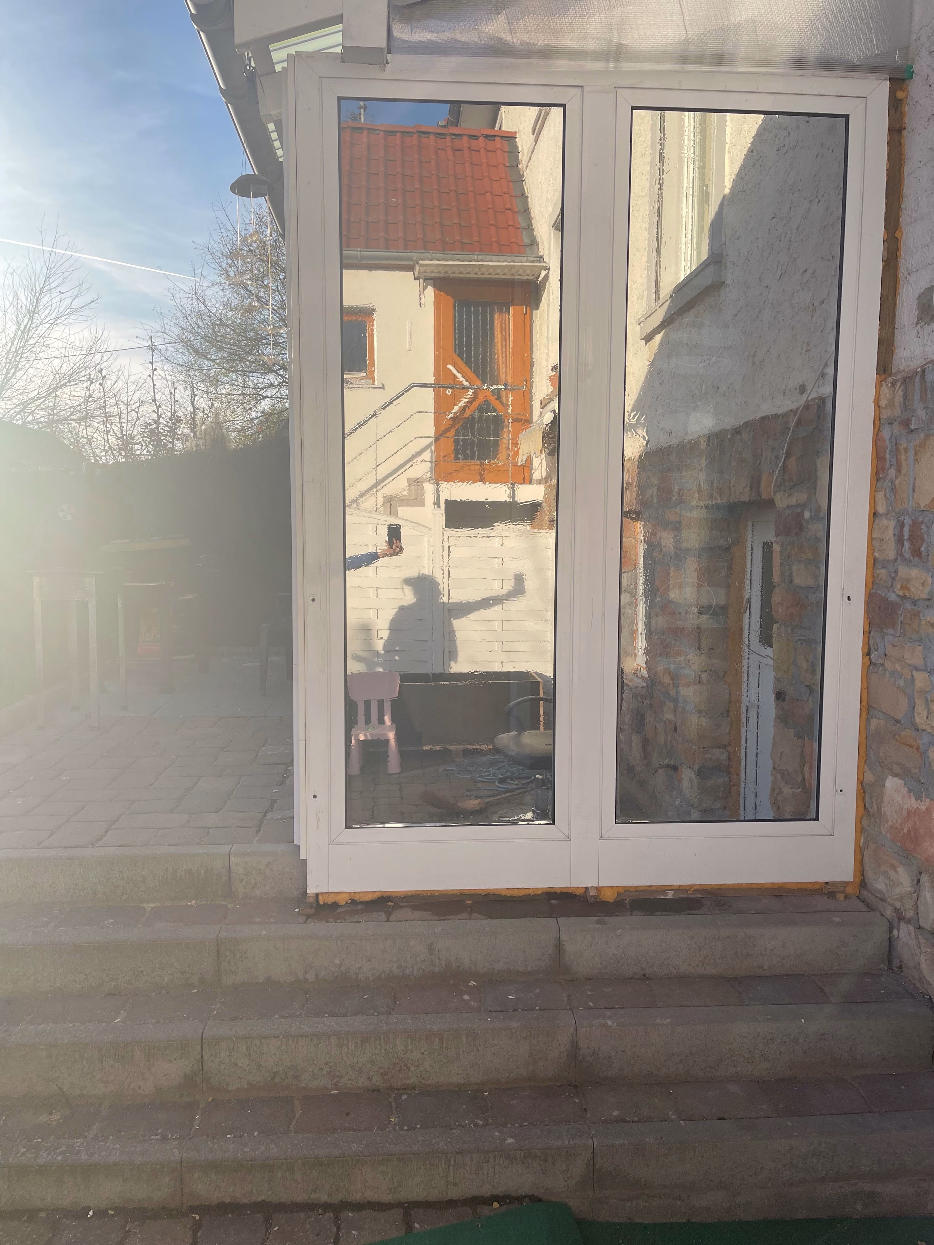 Terassentür mit Sonnenschutzfolie silber dunkel verspiegelt foliert