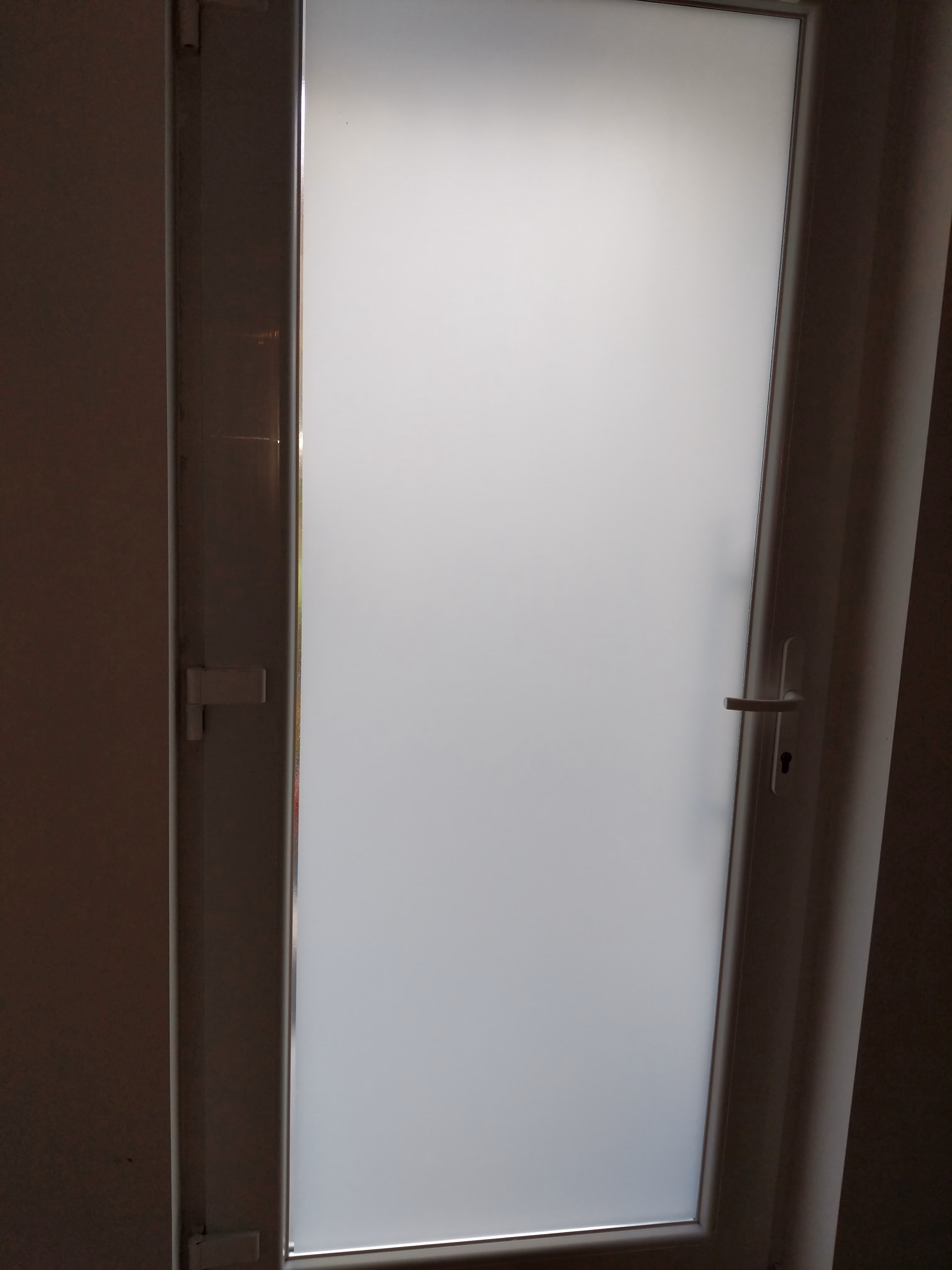 Milchglasfolie weiß matt auf Zimmer Glastür