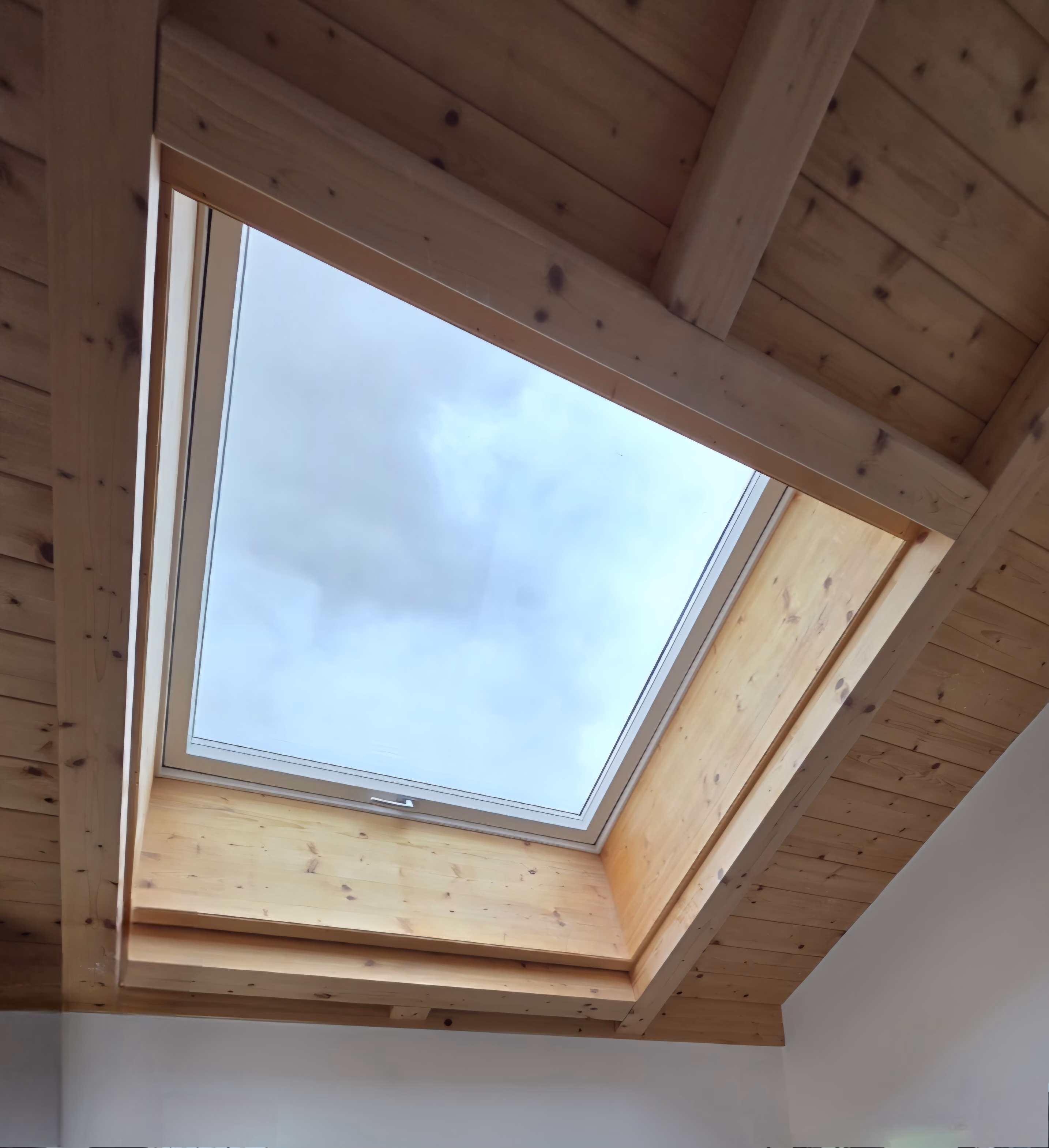 Schrägverglasung mit Sonnenschutzfolie nachgerüstet