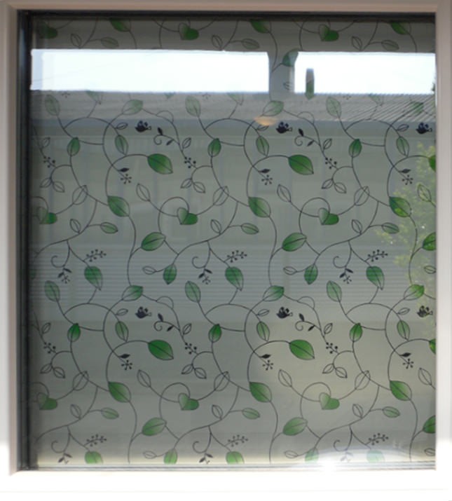 Sonnenschutzfolie - selbsthaftend - Mesh-Optik mit Dekor